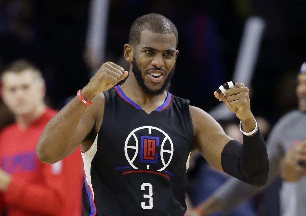 Clippers guard Chris Paul reacts after the Clippers defeated the Detroit Pistons, 105-103, in overtime.