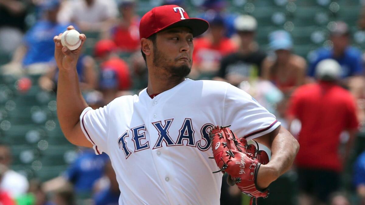 Texas' Yu Darvish pitches against the Angels on July 9.