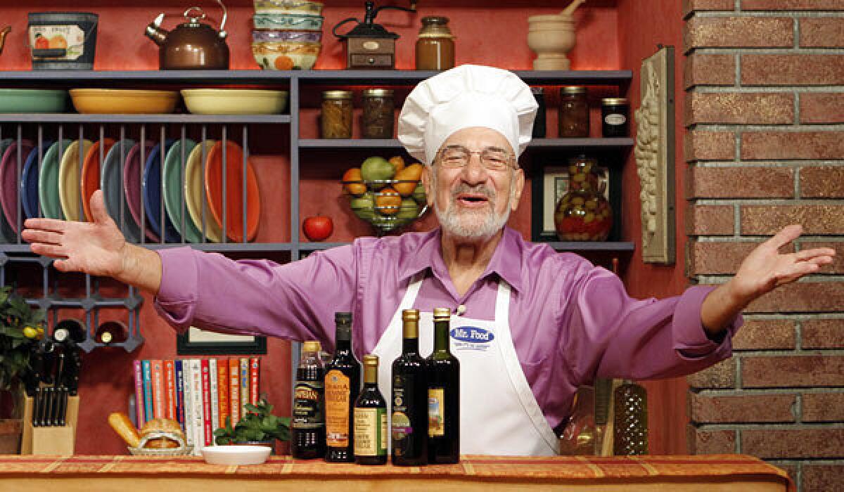 Art Ginsburg, who was known as Mr. Food, in his TV studio kitchen.