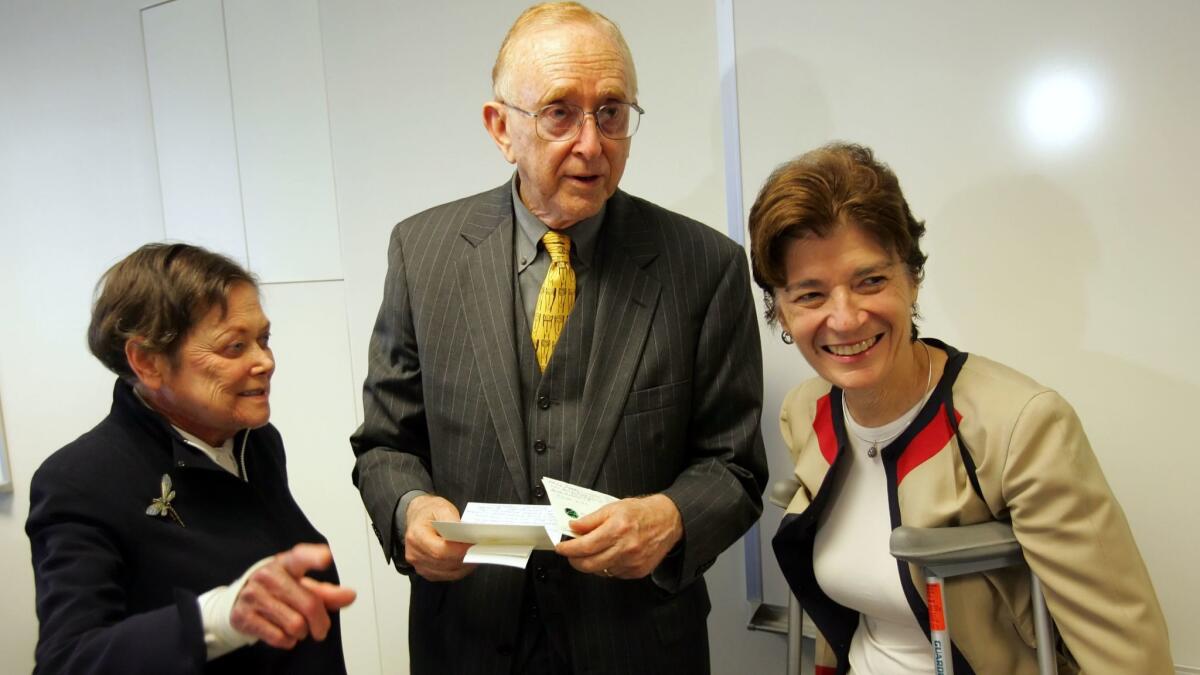 Herb Sandler, center, and Marion Sandler, left, co-chief executives of Golden West Financial Corp. with board member Maryellen Herringer in 2006.