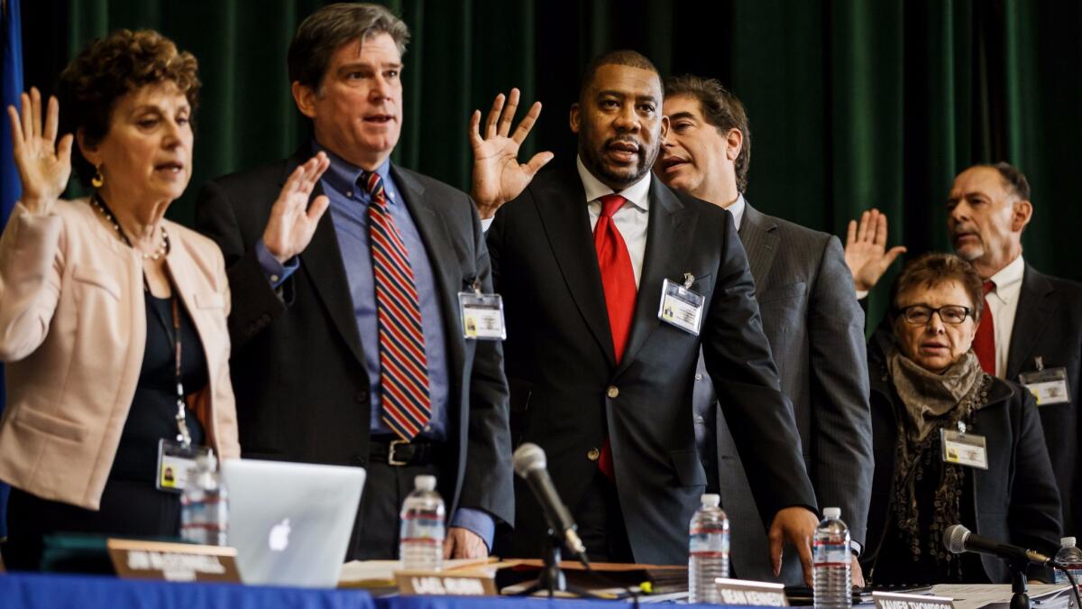Members of the Los Angeles County Sheriff Civilian Oversight Commission are sworn in earlier this year.