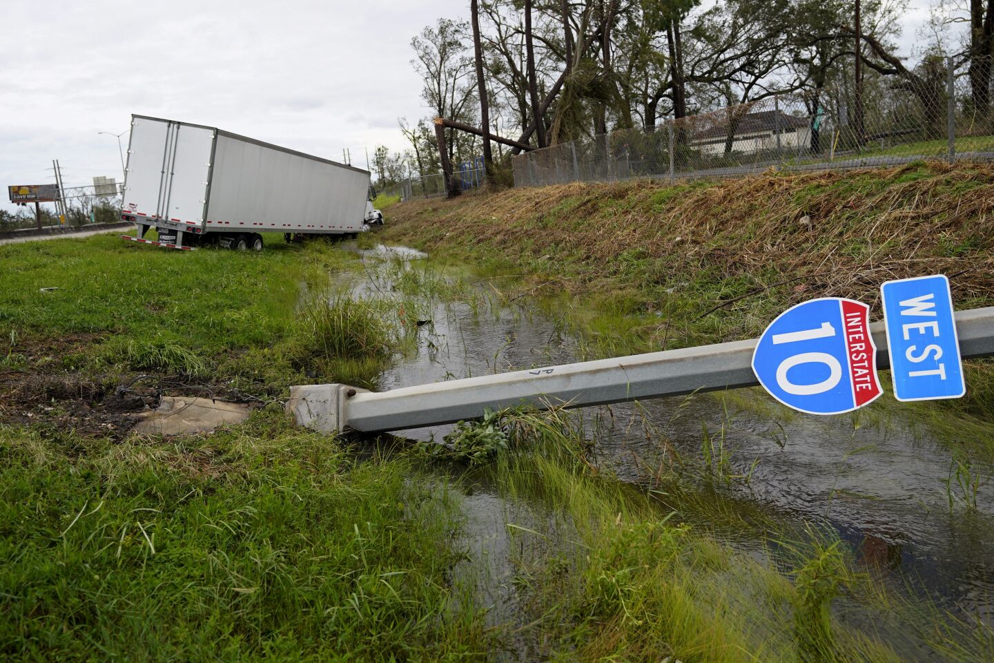 A truck sits in a ditch in Lake Charles, La.