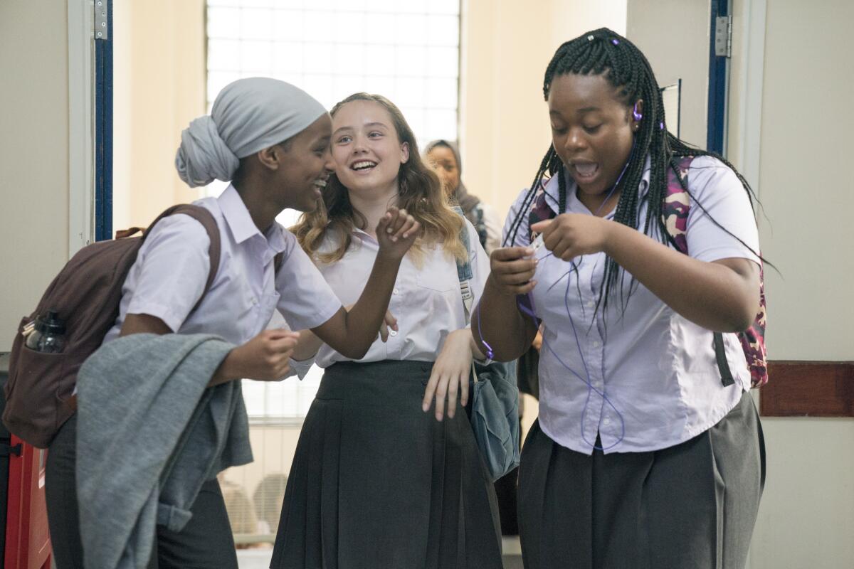 This image released by Altitude shows, from left, Kosar Ali, Ruby Stokes and Bukky Bakray in a scene from "Rocks." The film received seven nominations from the EE British Film Academy Awards (Aimee Spinks/Altitude via AP)