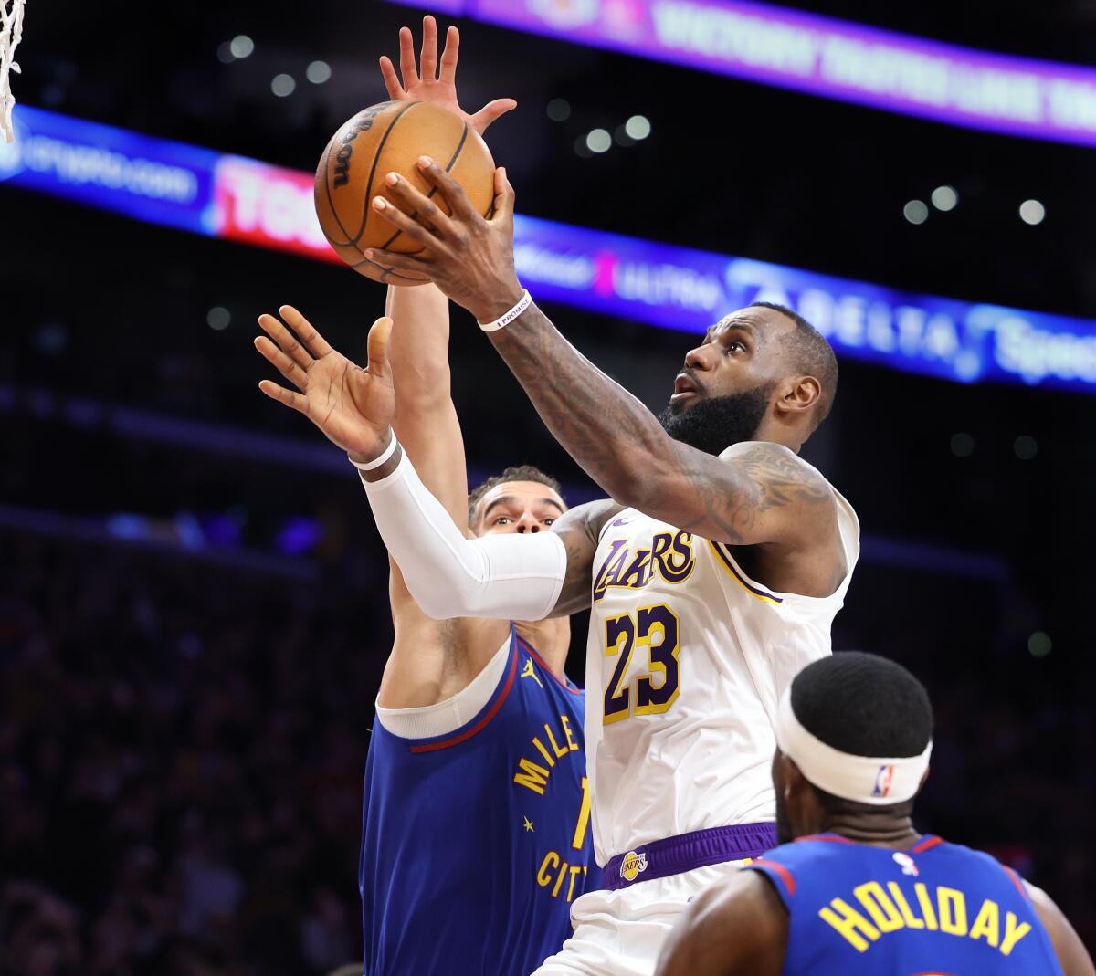 Lakers star LeBron James scores his 40,000th career point during the second quarter Saturday at Crypto.com Arena.