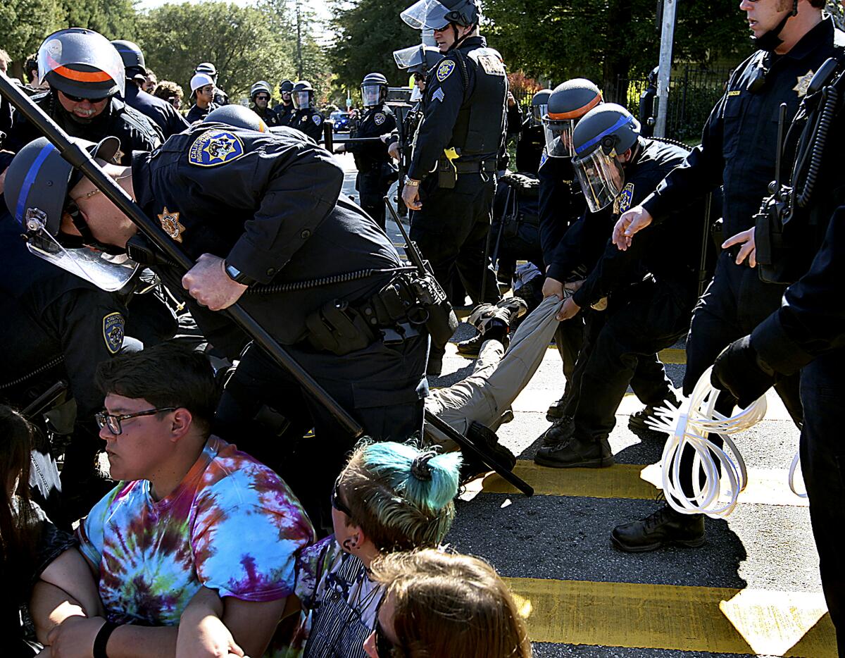 University of California police drag protesters during a 2020 strike at UC Santa Cruz.