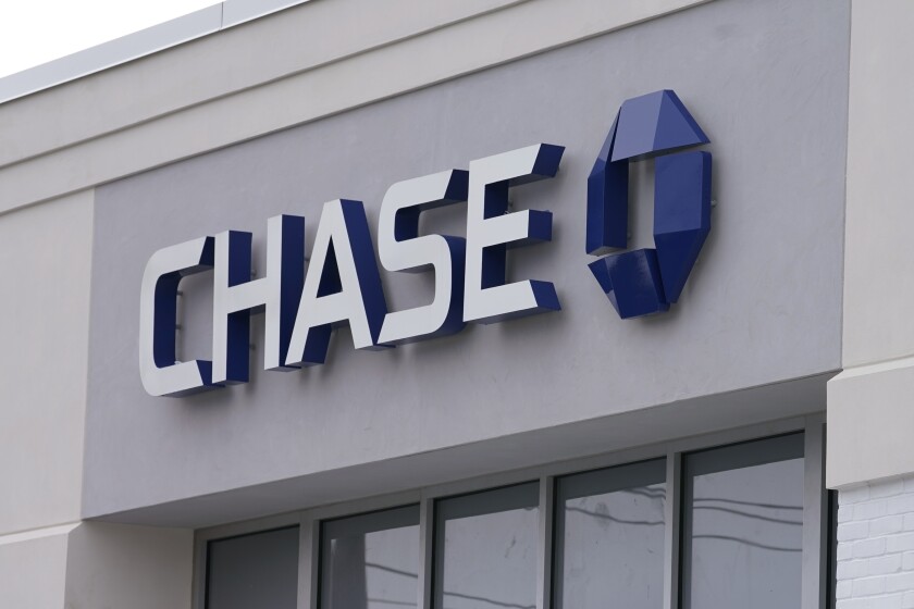 A Chase Bank is seen, Wednesday, Feb. 3, 2021, in Woburn, Mass. The nation’s largest banks are expected to report big profits for the first quarter, Tuesday, April 13, amid renewed confidence that pandemic-battered consumers and businesses can repay their debts and start borrowing again. (AP Photo/Elise Amendola)