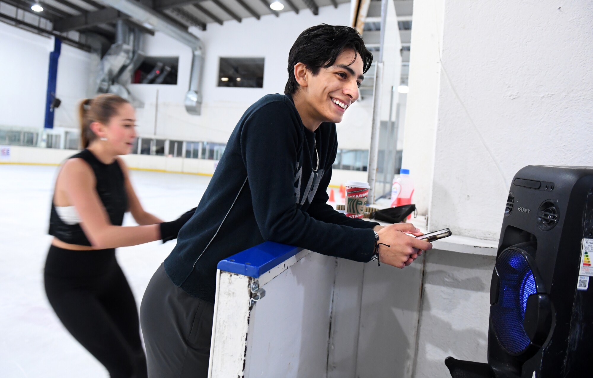 Mexican figure skater Donovan Carrillo takes a break during practice.