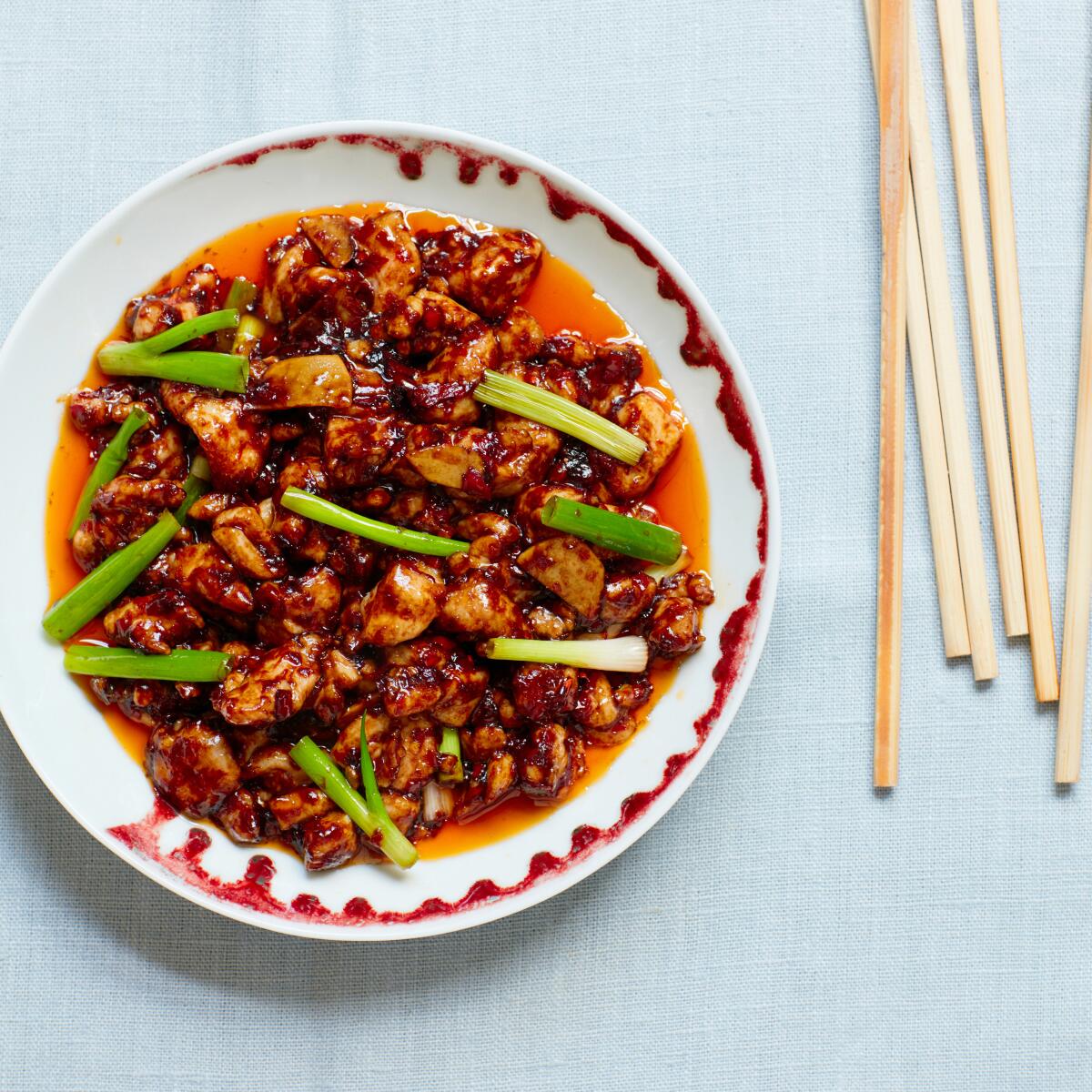 Scallion greens added at the end brighten this chile-paste kung pao chicken.