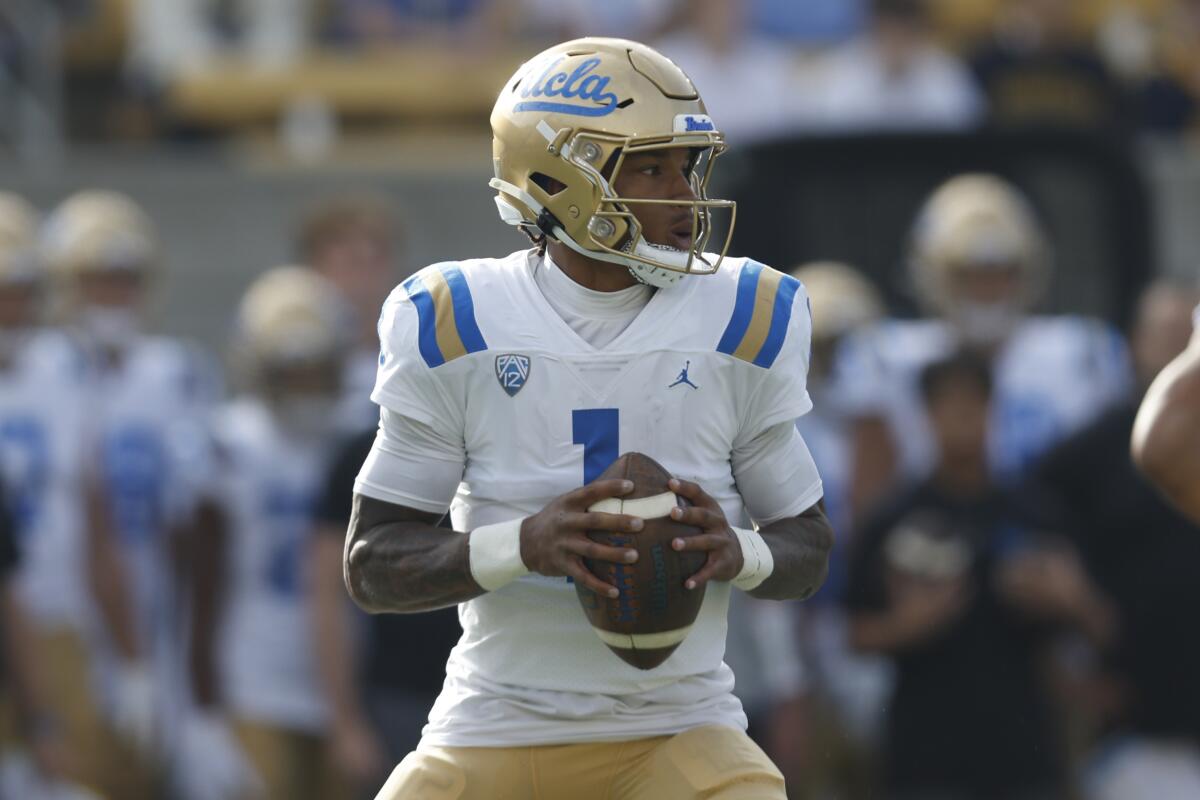 UCLA quarterback Dorian Thompson-Robinson passes against Cal on Nov. 25.