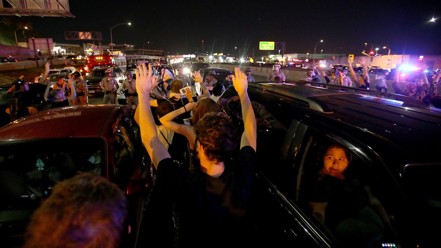 Protesters flood onto the 101 Freeway in downtown Los Angeles on Wednesday night.