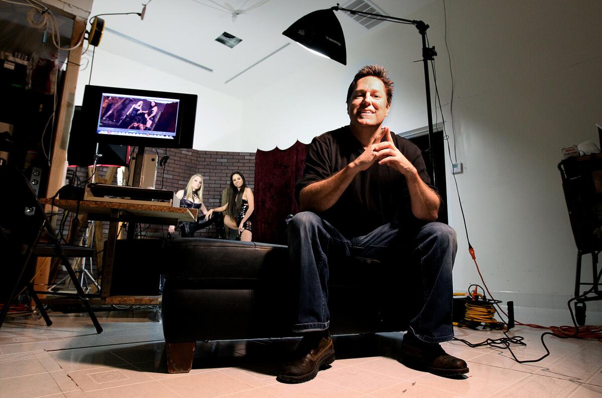 Glenn King, owner/director of Mean Bitch Productions, is photographed at his studio in Chatsworth. King said last year a condom mandate approved by voters made it "too complicated" to shoot in L.A.