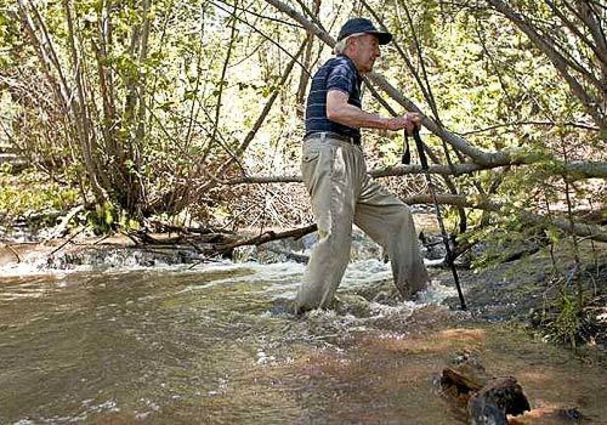 After splashing through calf-deep water in the Santa Fe National Forest, Stewart Udall said, "This is good wilderness. Any time you have to struggle a bit to cross a stream you've got good wilderness." He may be the politician most responsible for America's legacy of protected public lands.