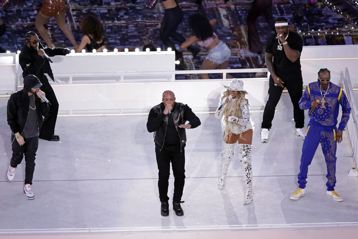 FILE -Eminem, Kendrick Lamar, Dr. Dre, Mary J. Blige, 50 Cent and Snoop Dogg, from left, perform during the halftime show during the NFL Super Bowl 56 football game between the Los Angeles Rams and the Cincinnati Bengals on Feb. 13, 2022, in Inglewood, Calif. The NFL has announced that Apple Music will be the new sponsor of the Super Bowl halftime show. The multi-year sponsorship will begin with Super Bowl 57 on Feb. 12, 2023, in Glendale, Ariz. Apple Music replaces Pepsi, who was the sponsor the past 10 years. (AP Photo/Adam Hunger, File)