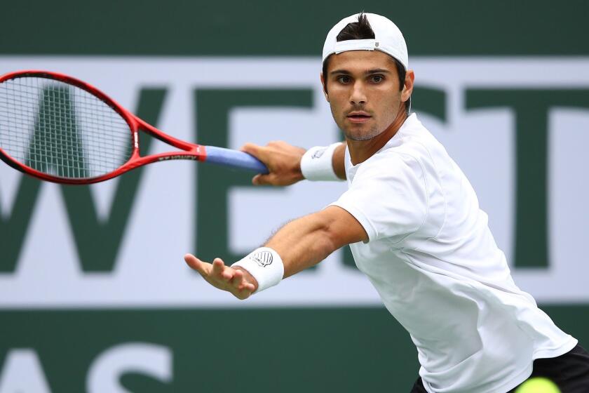 INDIAN WELLS, CALIFORNIA - MARCH 11: Marcos Giron of the United States plays a forehand against Milos Raonic of Canada during their men's singles third round match on day eight of the BNP Paribas Open at the Indian Wells Tennis Garden on March 11, 2019 in Indian Wells, California. (Photo by Clive Brunskill/Getty Images) ** OUTS - ELSENT, FPG, CM - OUTS * NM, PH, VA if sourced by CT, LA or MoD **