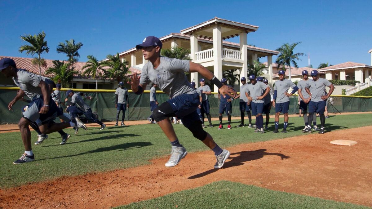 Mid-morning base running drills at the Padres baseball academy in San Cristobal, in the Dominican Republic.