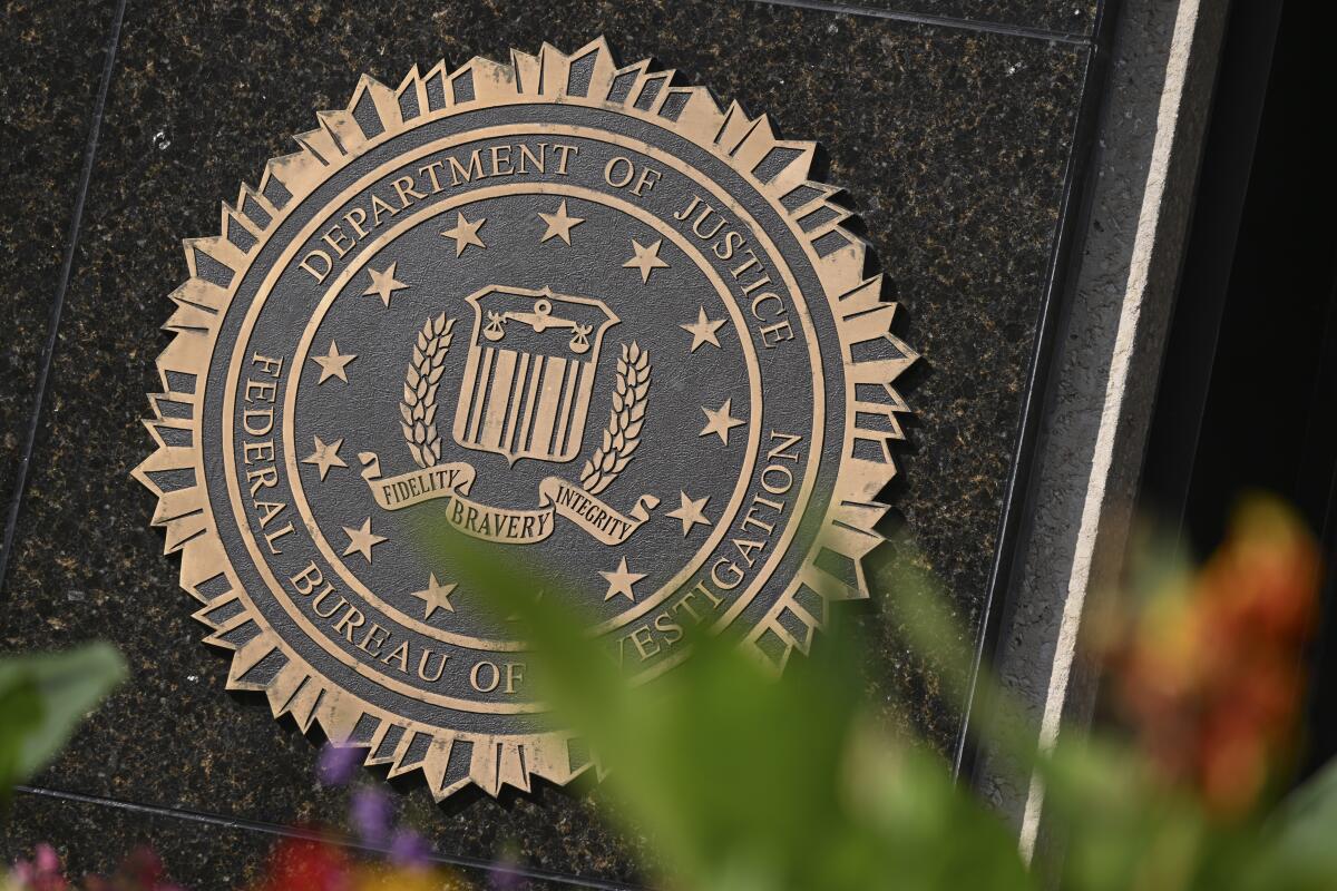 The Department of Justice has charged four men with perpetrating a scam 