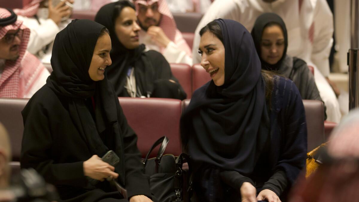 Visitors take their sits for the invitation-only screening in Riyadh.