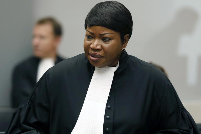 FILE - In this Tuesday Aug. 28, 2018 file photo, Prosecutor Fatou Bensouda at the International Criminal Court (ICC) in The Hague, Netherlands. The Prosecutor of the International Criminal Court said Wednesday, March 3, 2021 that she has launched an investigation into alleged crimes in the Palestinian territories. Fatou Bensouda said in a statement the probe will be conducted “independently, impartially and objectively, without fear or favor.” (Bas Czerwinski/Pool file via AP, File)