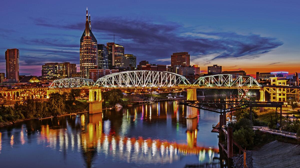 Twilight settles over the Cumberland River in Nashville.