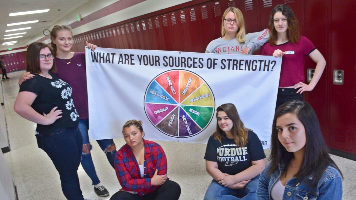 Student members of the Sources of Strength suicide prevention awareness program at Logansport High School in Logansport, Ind., in May.