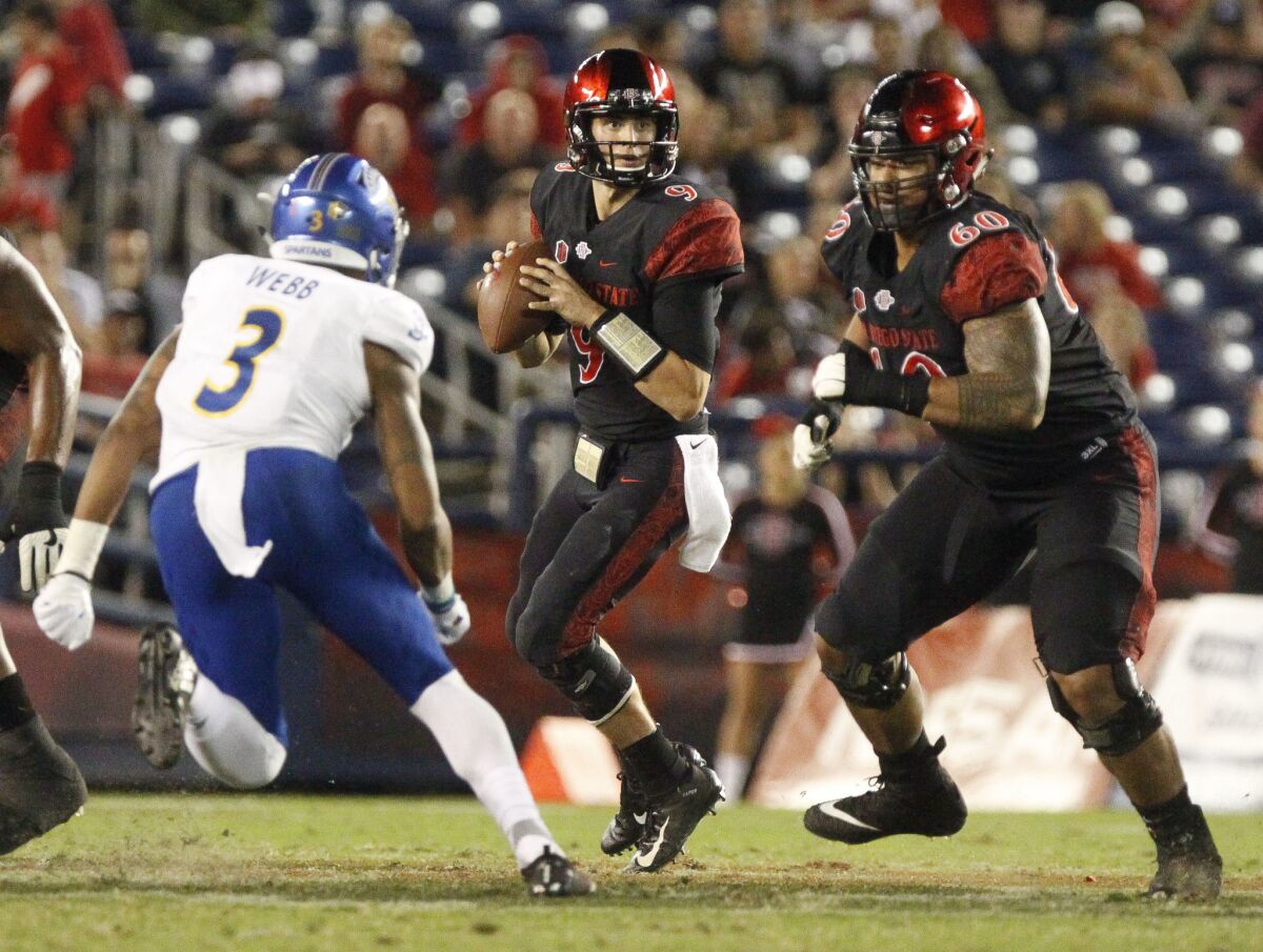 San Diego State center Keith Ismael (right) was a three-time all-Mountain West selection for the Aztecs. The junior from Oakland had one more year of college eligibility, but has chosen to enter the 2020 NFL Draft.