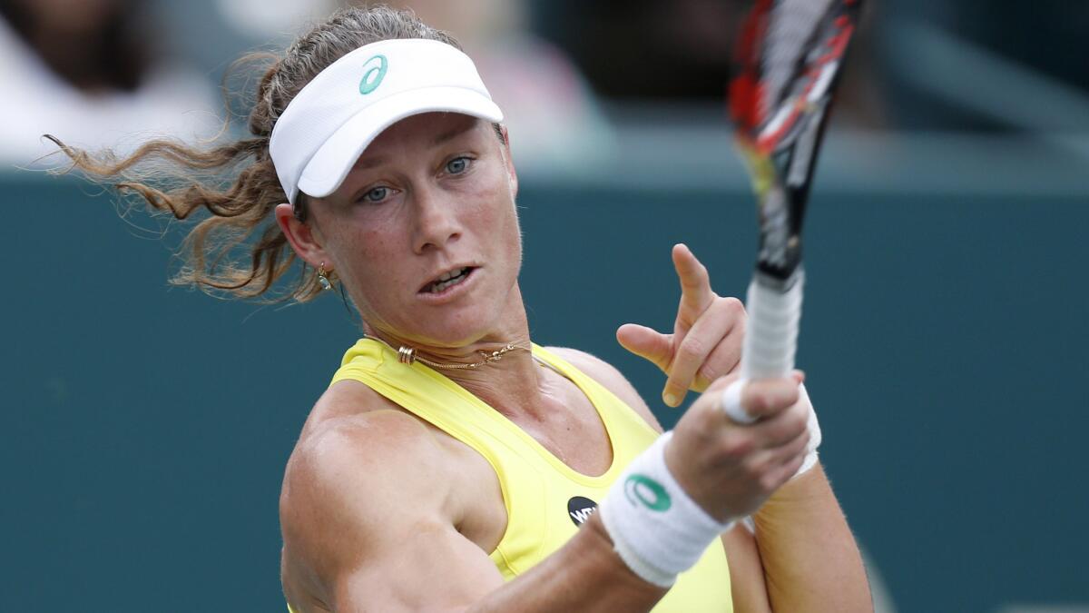 Samantha Stosur hits a return during a match against Sesil Karatantcheva at the Family Circle Cup in Charleston, S.C., on April 7, 2015.
