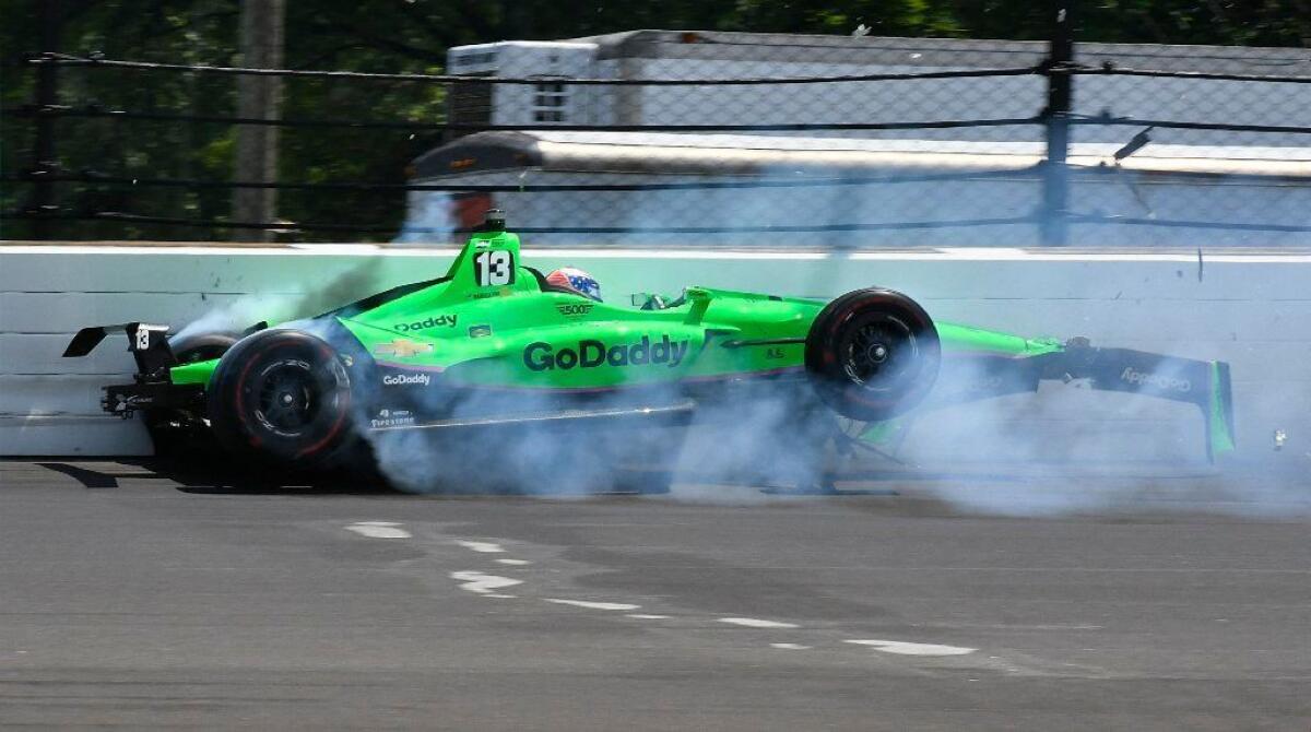 Danica Patrick hits the wall in the second turn during the running of the Indianapolis 500 on Sunday.