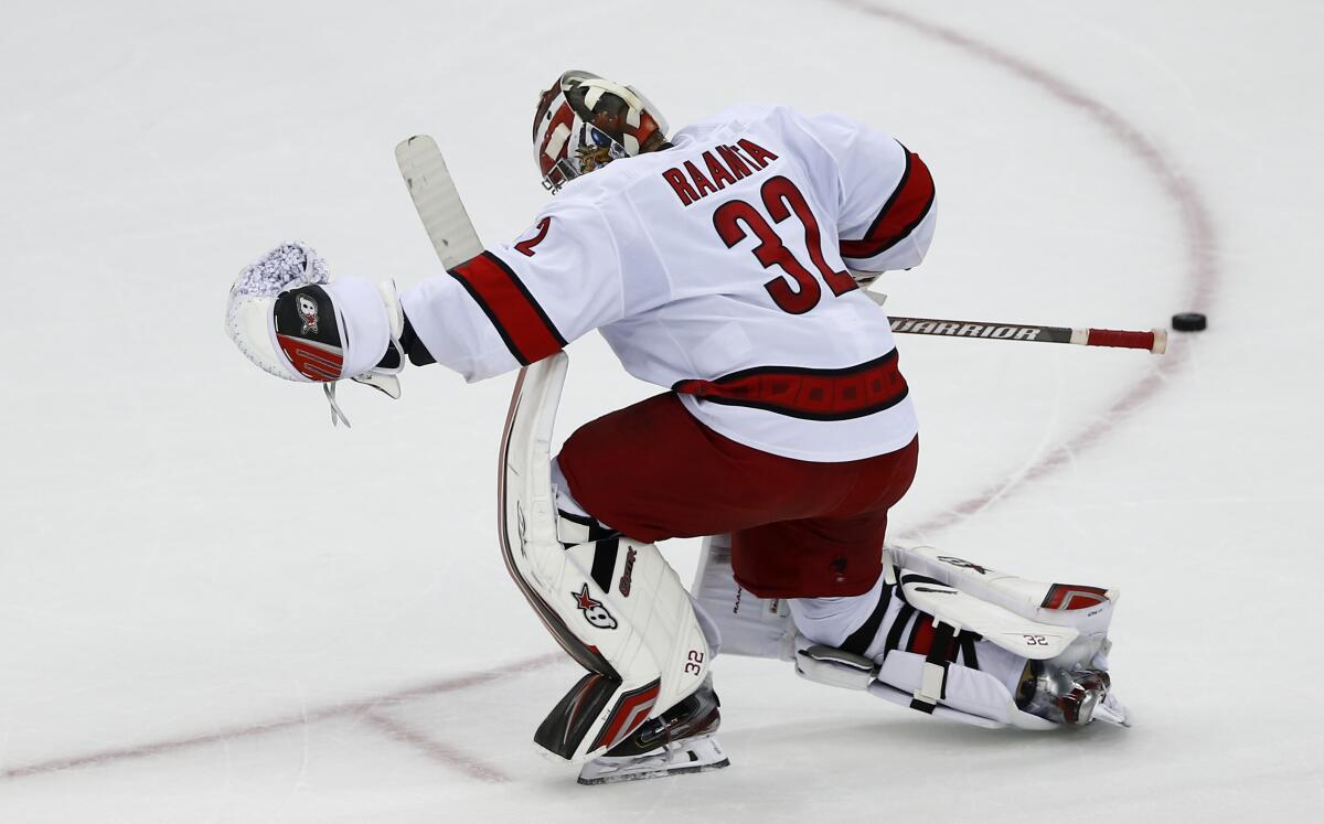 Images from Carolina Hurricanes' 3-2 overtime victory over the New Jersey  Devils