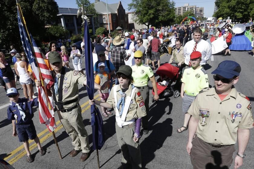 Boy Scouts line up before marching in the Utah Gay Pride Parade in Salt Lake City in June 2013.