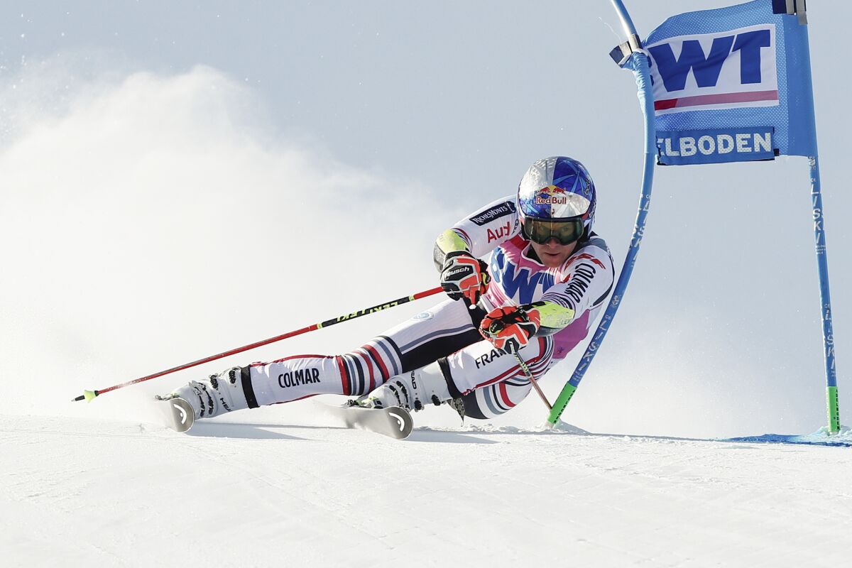 France's Alexis Pinturault speeds down the course during an alpine ski, men's World Cup Giant slalom, in Adelboden, Switzerland, Saturday, Jan. 9, 2021. (AP Photo/Gabriele Facciotti)