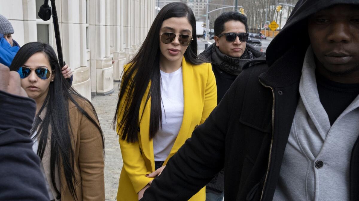 Emma Coronel Aispuro, center, wife of Joaquin "El Chapo" Guzman, arrives at federal court, Monday, Feb. 11, 2019, in New York.