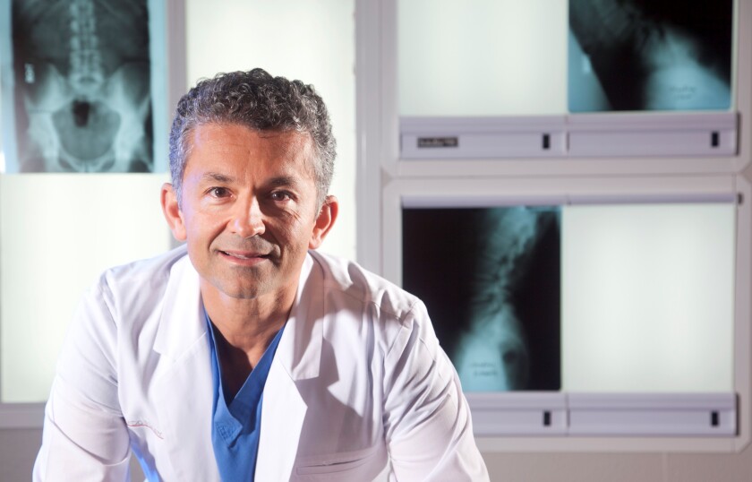 Dr. Kamshad Raiszadeh, founder and chief medical officer of SpineZone.