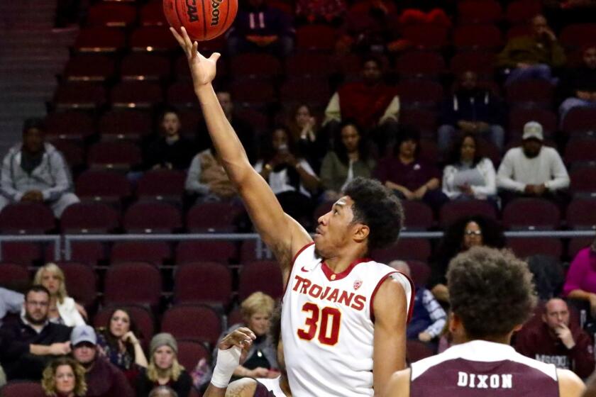 USC guard Elijah Stewart lays up a fast break basket in the first half against Missouri State in the Las Vegas Classic at Orleans Arena on Dec. 22.