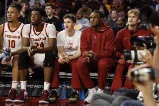 Los Angeles, Ca, Wednesday, November 29, 2023 - Bronny James watches from the bench as USC plays Eastern Washington at Galen Center. (Robert Gauthier/Los Angeles Times)