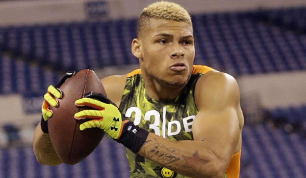 Tyrann Mathieu runs a drill at the NFL scouting combine in February.