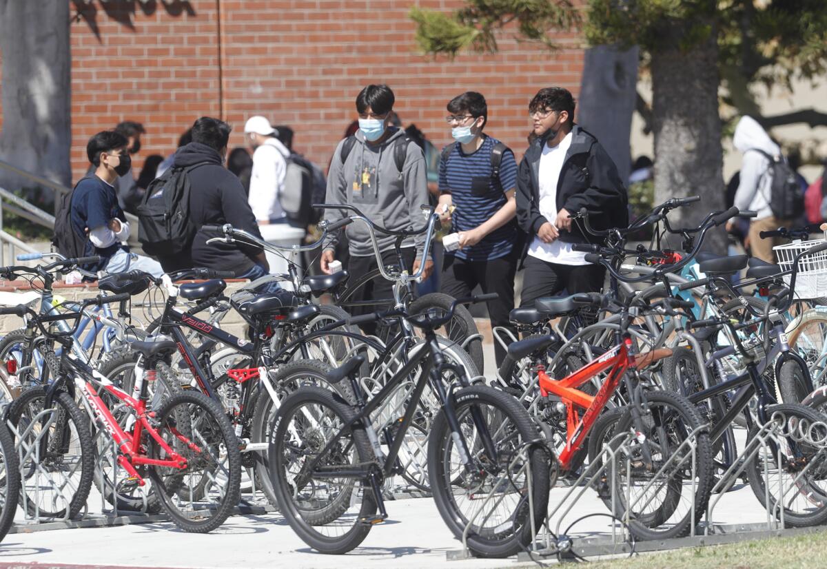 Students on their lunch hour at Estancia High in Costa Mesa, where an unknown threat was made over the weekend.