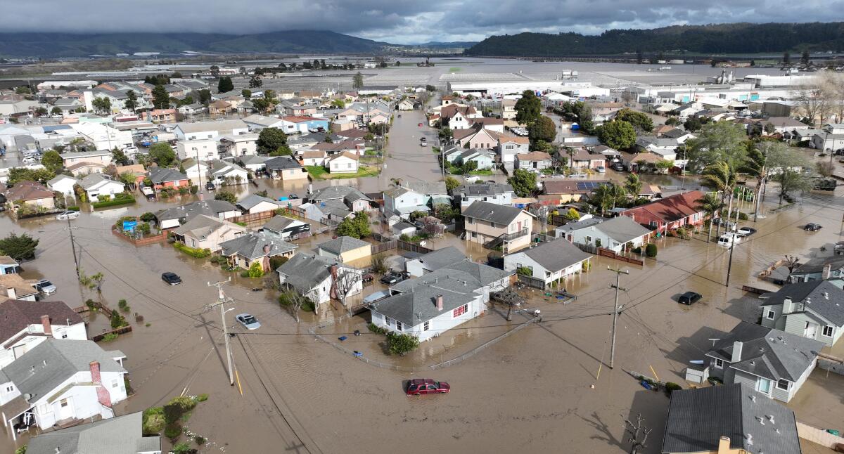 Floodwaters engulf the town of Pajaro.