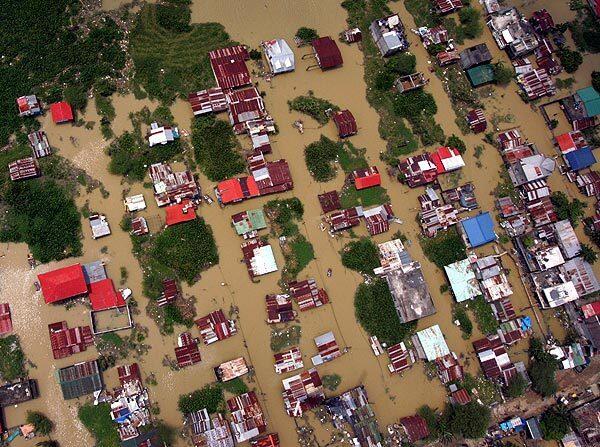 A residential area in Angono town, east of Manila, is partly submerged after Typhoon Parma passed through.