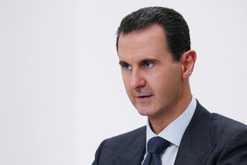 FILE - In this photo released on Nov. 9, 2019 by the Syrian official news agency SANA, Syrian President Bashar Assad speaks in Damascus, Syria. In a landmark trial, a Paris court will this week seek Tuesday May 21, 2024 to determine whether Syrian intelligence officials were responsible for Patrick and Mazzen Dabbagh's disappearance and deaths. The hearings are expected to air chilling allegations that President Bashar Assad's regime has widely used torture and arbitrary detentions to keep power in Syria's civil war. (SANA via AP, File)