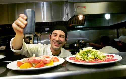 Chef Alberto Lazzarino in the kitchen of Osteria La Buca on Melrose Avenue. He started in L.A. at Mauro Vincenti's Rex and Alto Palato, then cooked at Piccolo Ristorante in Venice before opening Melograno in Hollywood.