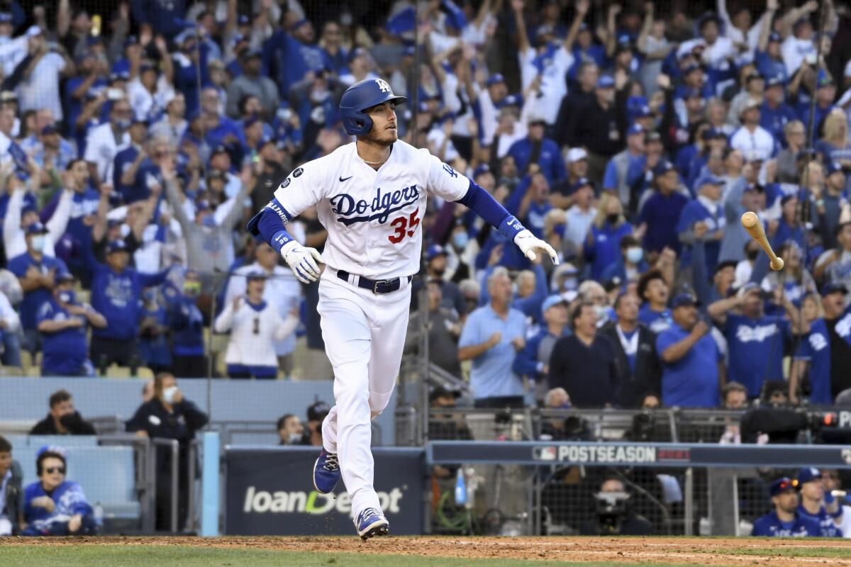 Dodgers outfielder Cody Bellinger celebrates after hitting a home run against the Atlanta Braves in the 2021 NLCS.