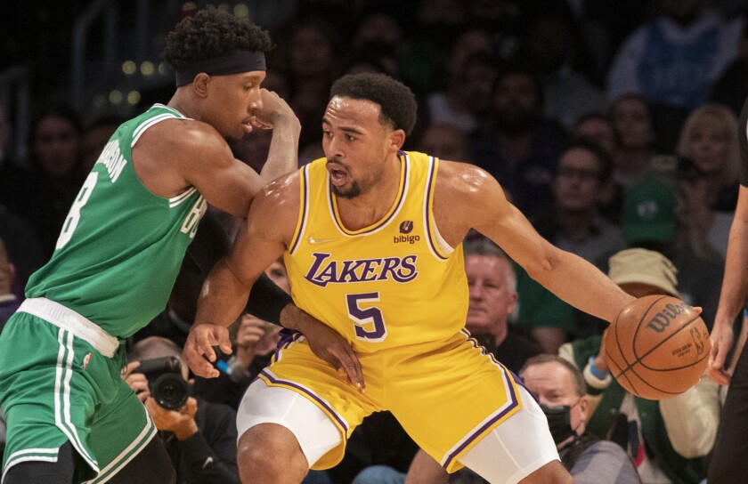 Lakers guard Talen Horton-Tucker drives on Celtics guard Josh Richardson.
