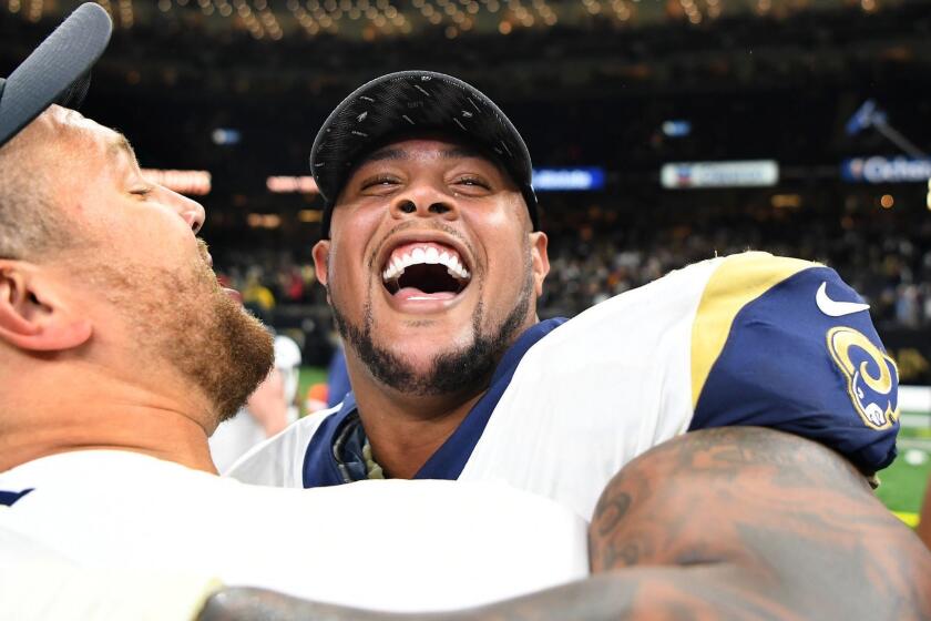 NEW ORLEANS. LOUISIANA JANUARY 20, 2018-Rams Rodger Saffold celebrates after defeating the Saints in the NFC Championship at the Superdome in New Orleans Sunday. (Wally Skalij/Los Angeles Times)