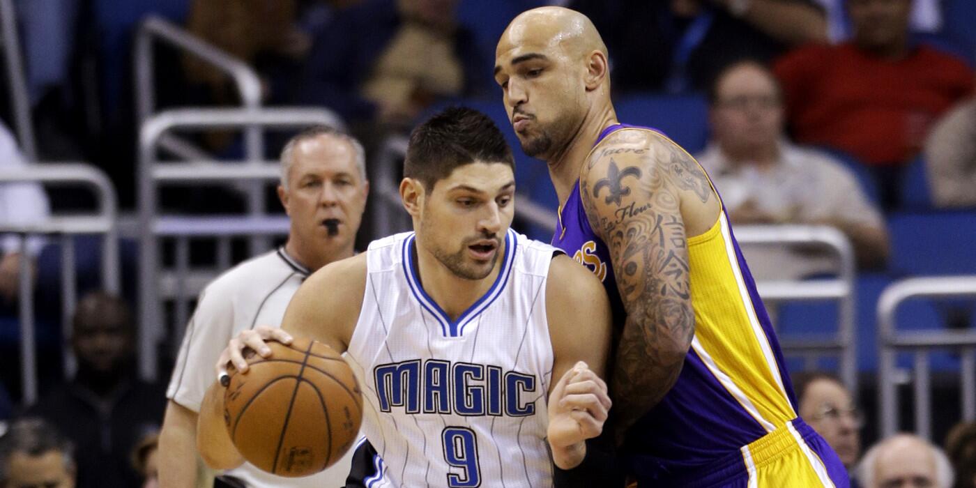 Nikola Vucevic, Robert Sacre