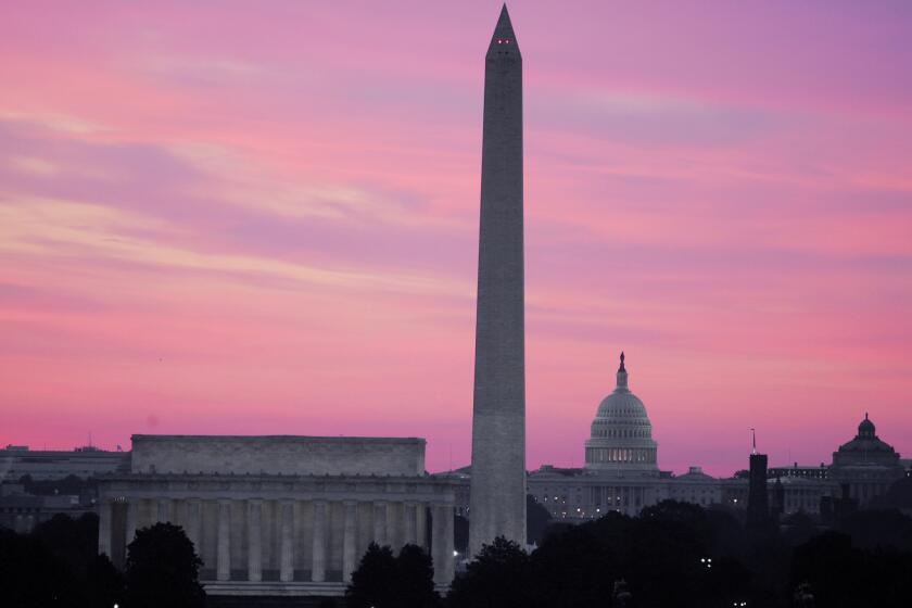 A view of the skyline of Washington, D.C., shows the Washington Monument, the Lincoln Memorial and the U.S. Capitol. No skyscrapers jut from the low-lying federal city, allowing iconic structures to dominate the horizon. But proposals are in the works to raise the height limit for new buildings.