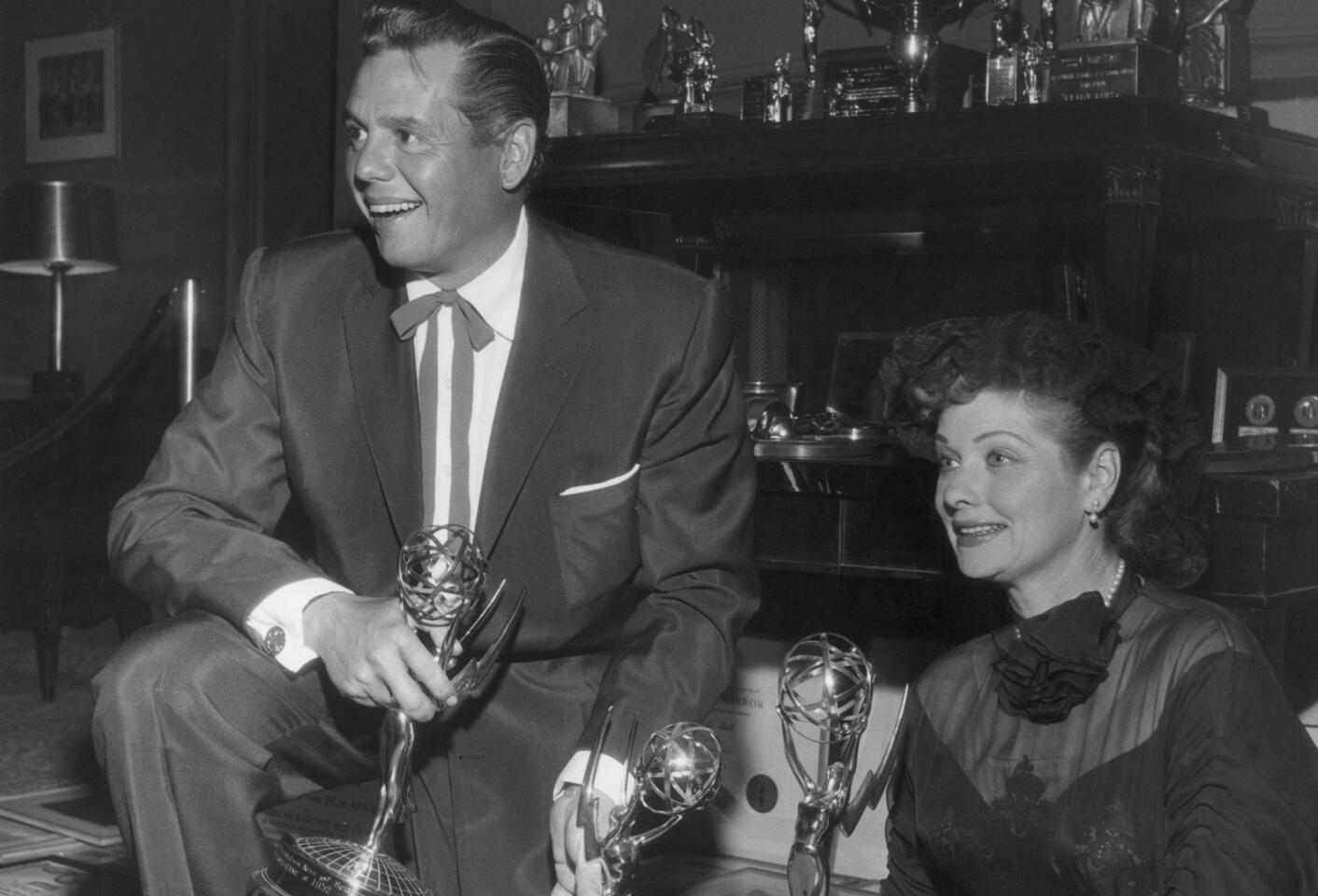Lucille Ball and Desi Arnaz, power couple of the '50s, hosted the 4th Emmy Awards show. Their night as emcees marked the first time television personalities had hosted the ceremony. A coincidence in numbers: Ball won a total of four Emmys throughout her career.