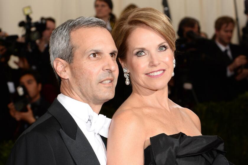 John Molner and Katie Couric, shown at New York's Met Gala red carpet in May, got married Saturday in East Hampton.