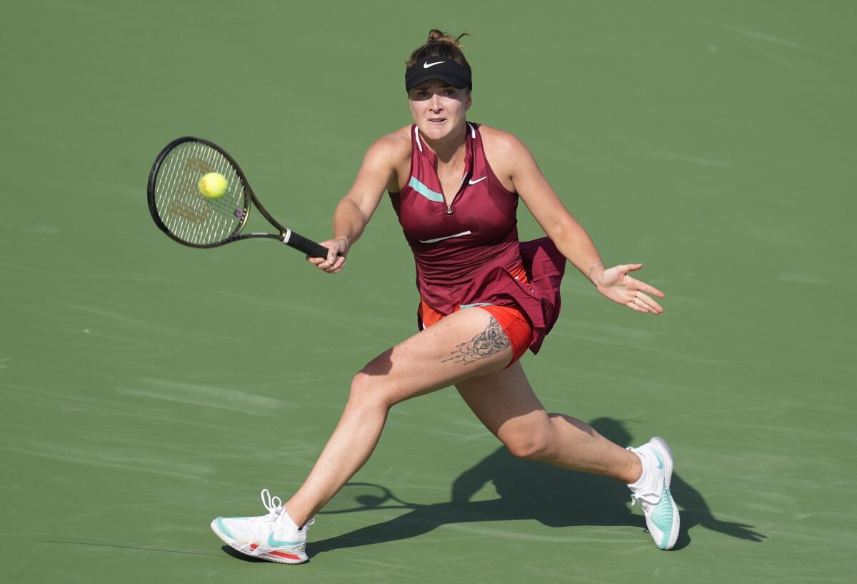 Elina Monfils returns a serve Feb. 15 in Dubai.