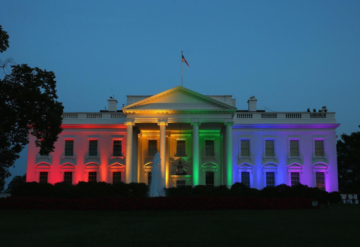 Rainbow-colored lights shine on the White House after the Supreme Court ruling in favor of same-sex marriage on June 26.