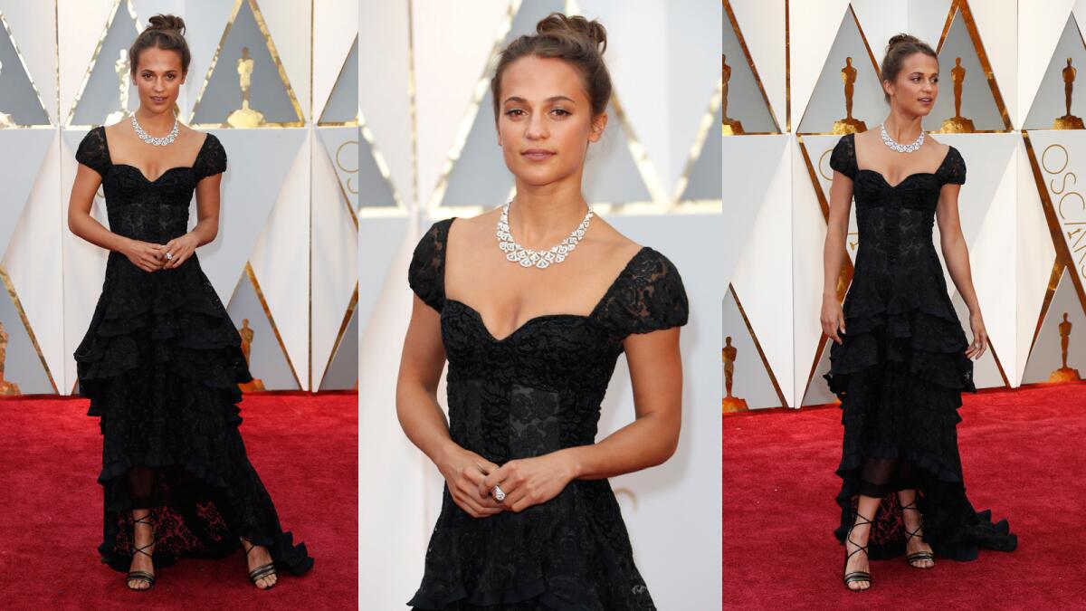 Alicia Vikander is a picturesque vision of romance and glamour in Louis Vuitton. Her little black dress made a big statement and catapulted her onto the best-dressed list.